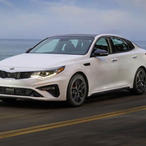 2019-Kia-Optima-SX-front-three-quarter-in-motion-1
